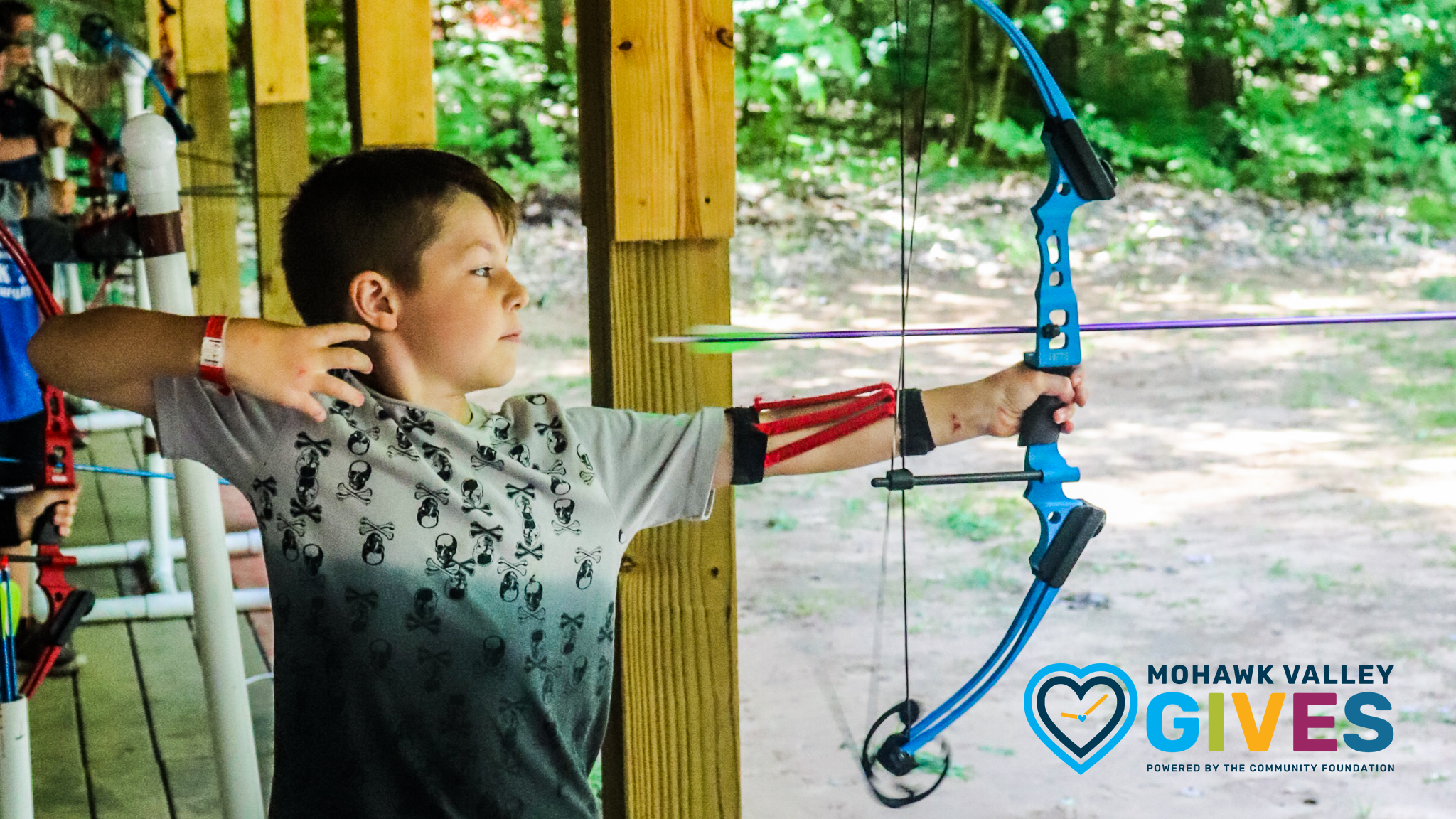 Scout At Camp Kingsley Taking Part in Archery